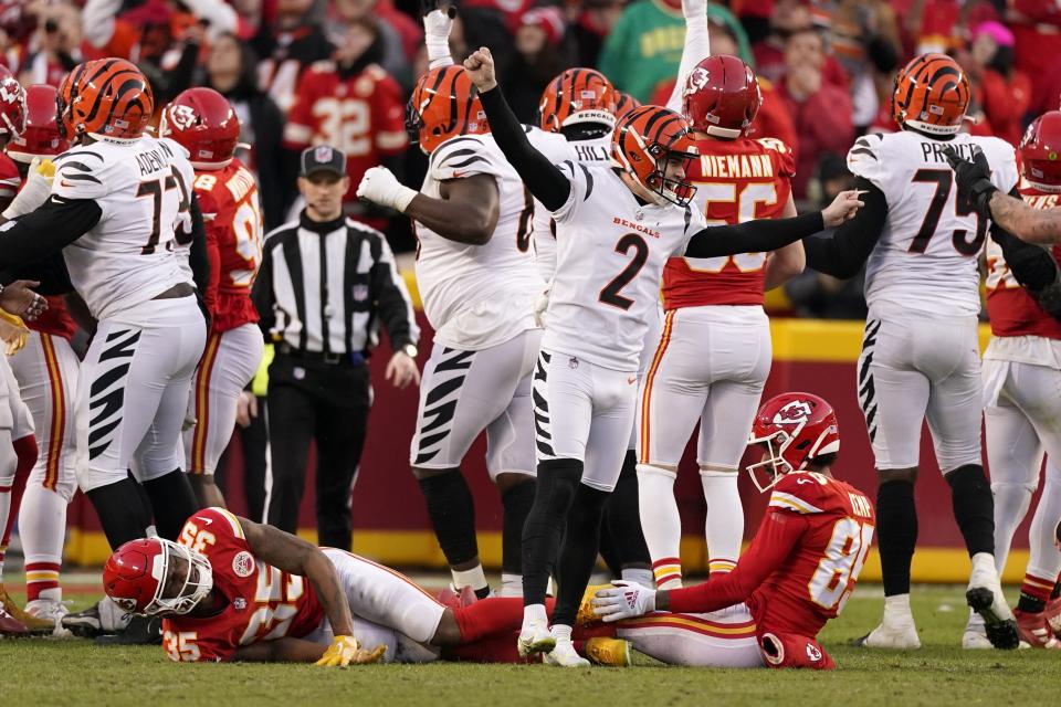 Cincinnati Bengals kicker Evan McPherson (2) celebrates after kicking a 31-yard field goal during overtime in the AFC championship NFL football game against the Kansas City Chiefs, Sunday, Jan. 30, 2022, in Kansas City, Mo. The Bengals won 27-24. (AP Photo/Charlie Riedel)