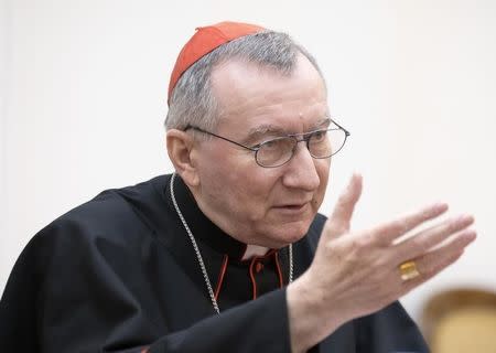 Cardinal Pietro Parolin, the Vatican's Secretary of State, speaks during his official visit with Belarussian Foreign Minister Vladimir Makei in Minsk, March 13, 2015. REUTERS/Vasily Fedosenko