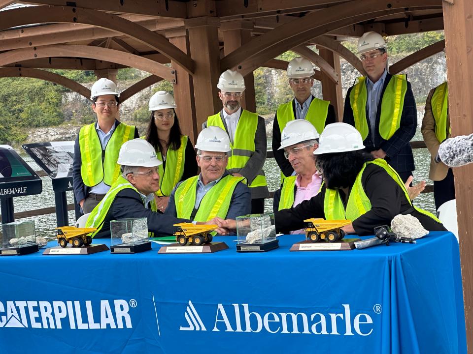 Albemarle and Caterpillar Inc. announced a partnership in this Star file photo. Leaders from both companies signed an agreement at the site of the lithium mine in Kings Mountain.