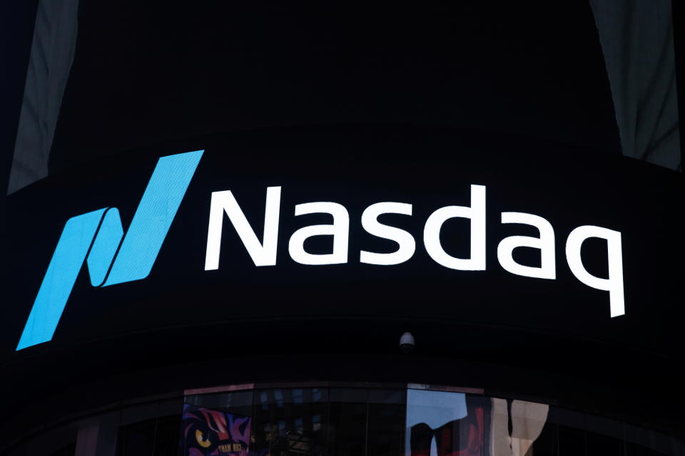 The Nasdaq logo is displayed at the Nasdaq Market site in Times Square in New York City, U.S., December 3, 2021. REUTERS/Jeenah Moon