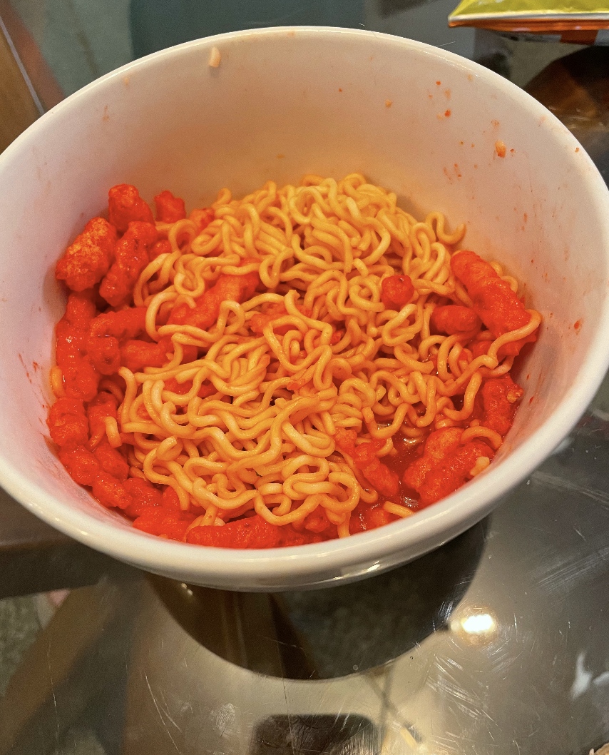 bowl of ramen with hot cheetos
