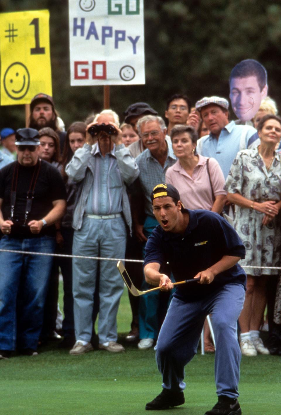 Adam Sandler plays golf in a scene from the film 'Happy Gilmore', 1996. (Photo by Universal/Getty Images)