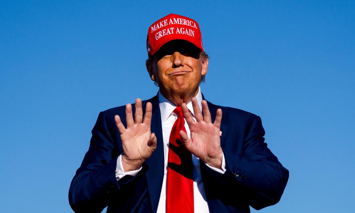 <span>Donald Trump at his campaign rally in Michigan.</span><span>Photograph: Nic Antaya/Getty Images</span>