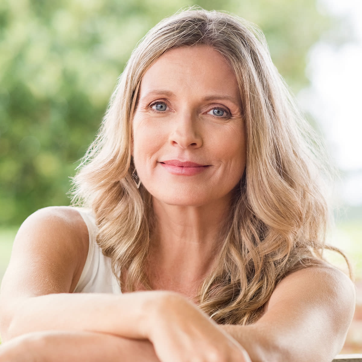 middle-aged-blonde-woman-smiling-gently