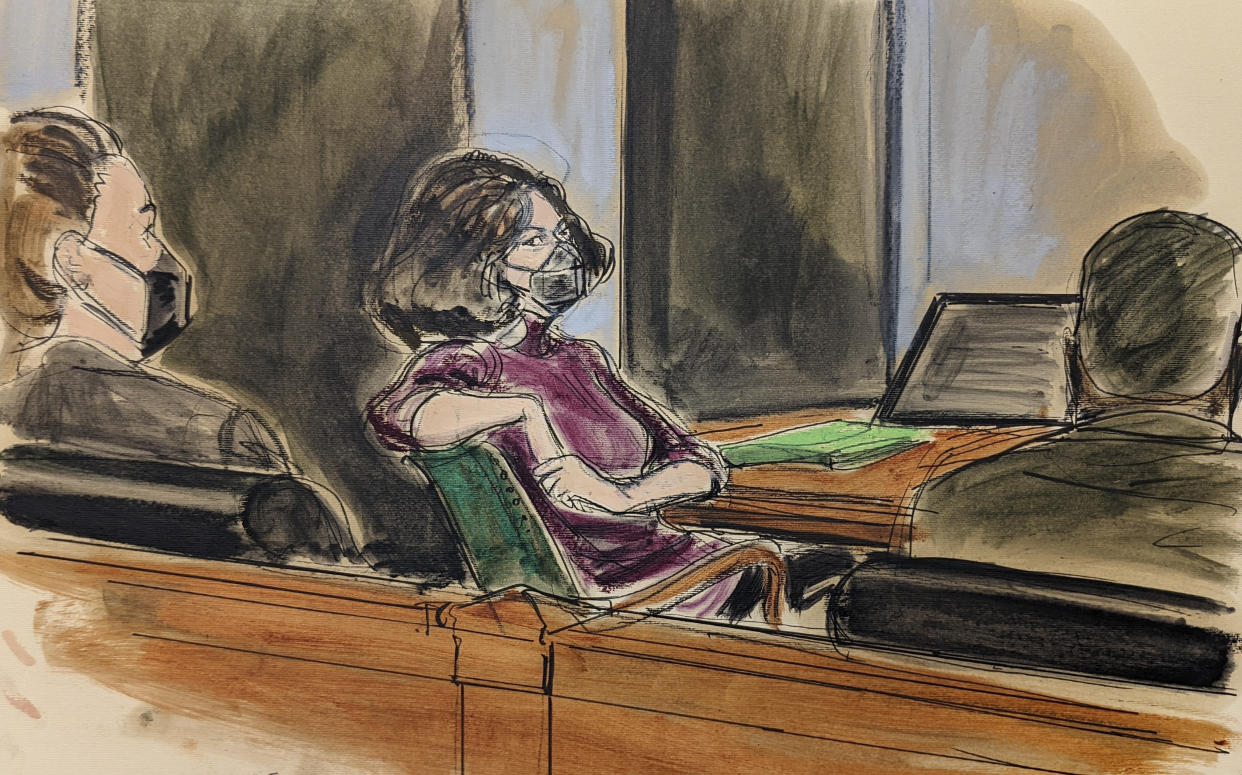 In this courtroom sketch, Ghislaine Maxwell, center, sits in the courtroom during a discussion about a note from the jury, during her sex trafficking trial, Wednesday, Dec. 29, 2021, in New York. (AP Photo/Elizabeth Williams)