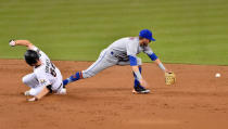 New York Mets second baseman Gavin Cecchini is late on the tag of Miami Marlins starting pitcher Dan Straily at second base in the second inning. Steve Mitchell-USA TODAY Sports