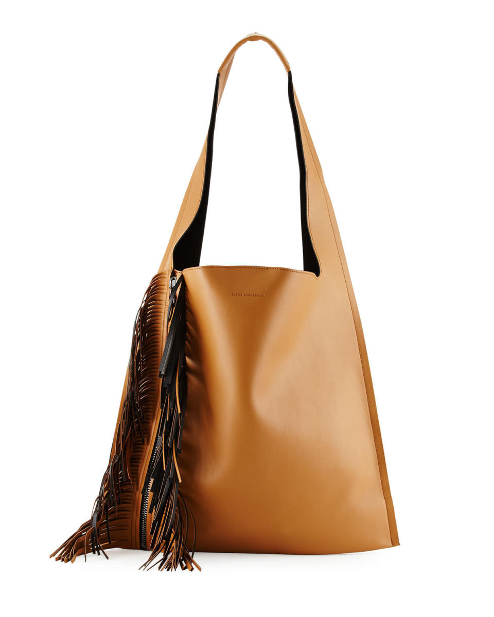 <p>Estica Bicolor Fringe Shoulder Bag, $1,150, <a href="http://www.neimanmarcus.com/Elena-Ghisellini-Estia-Bicolor-Fringe-Shoulder-Bag-Tan-Black-Elena-Ghisellini/prod180440674_cat56090760__/p.prod?icid=&searchType=EndecaDrivenCat&rte=%252Fcategory.jsp%253FitemId%253Dcat56090760%2526pageSize%253D30%2526No%253D0%2526refinements%253D&eItemId=prod180440674&cmCat=product" rel="nofollow noopener" target="_blank" data-ylk="slk:Neiman Marcus;elm:context_link;itc:0;sec:content-canvas" class="link ">Neiman Marcus</a></p>