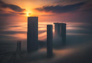 <p>Tall buildings at sunset. (Photograph by Khalid Alhammadi/Caters News) </p>