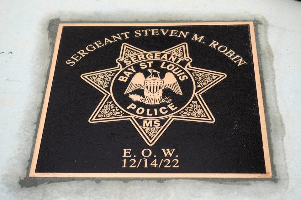 A commemorative star in honor of Sergeant Steven Robin outside the new Bay St. Louis Police Department in Bay St. Louis on Thursday, Dec. 14, 2023. Different from other commemorative stars in Bay St. Louis, the one honoring Robin has seven points, matching the seven point star Bay St. Louis officers wear.