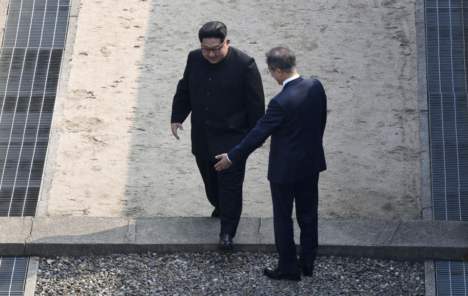 <em>North Korean leader Kim Jong-un makes history by crossing the border to meet South Korean President Moon Jae-in (Picture: AP)</em>