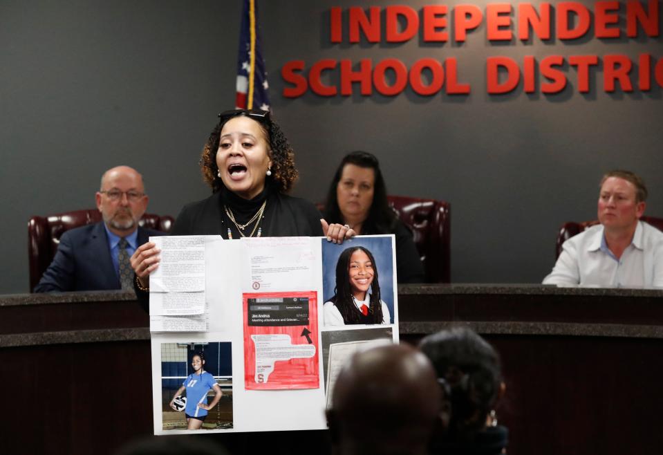 JaQuatta Manahan talks to Slaton school board members Thursday night about her daughter, who she says is a victim of racial discrimination. Slaton ISD board members heard from several parents and students regarding race-related issues at the beginning of their Board of Trustees meeting Thursday.