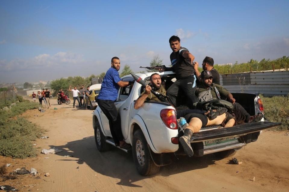 The body of Shani Louk is later seen in the back of Hamas terrorists’ pickup truck after the festival. AP