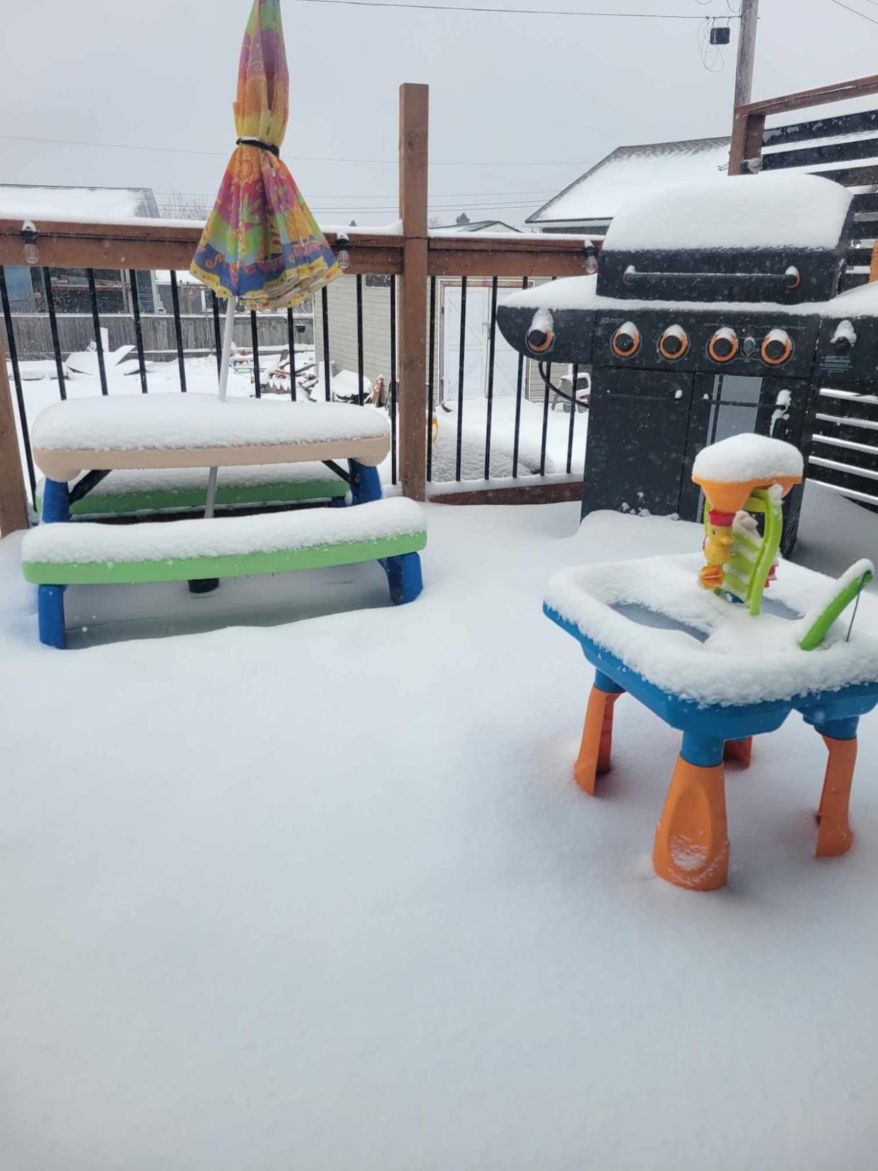 People in Labrador City and Wabush woke up Thursday to more snow than they likely would want for late May. (Submitted by Danielle Ballard  - image credit)