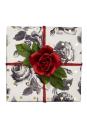 <p>Anyone with an affinity for gardening will love this gift wrap covered in roses. Top the box with a beautiful faux red rose.</p>