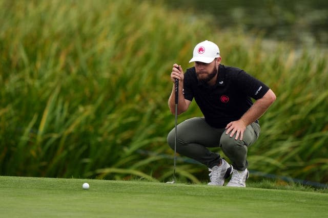 Tyrrell Hatton lines up a putt