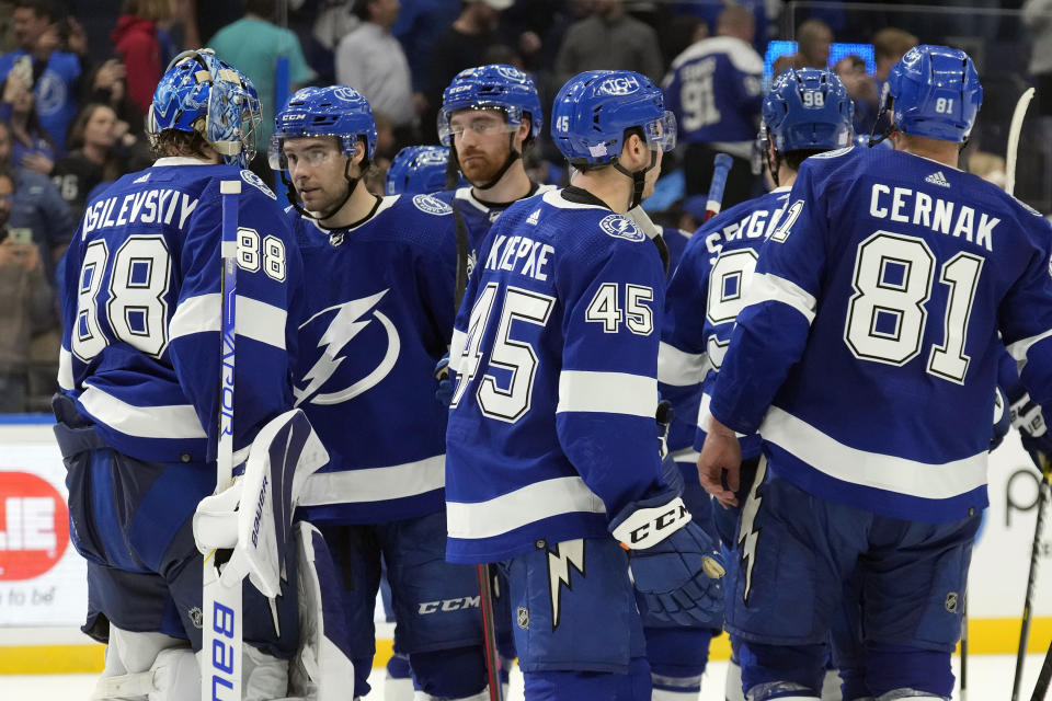 Tampa Bay Lightning goaltender Andrei Vasilevskiy (88) celebrates with his teammates after the team defeated the Ottawa Senators during an NHL hockey game Tuesday, Nov. 1, 2022, in Tampa, Fla. (AP Photo/Chris O'Meara)