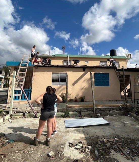 One of the jobs Mount Union’s Social Responsibility class took on during their trip to the Dominican Republic was to replace the roof on a house.
