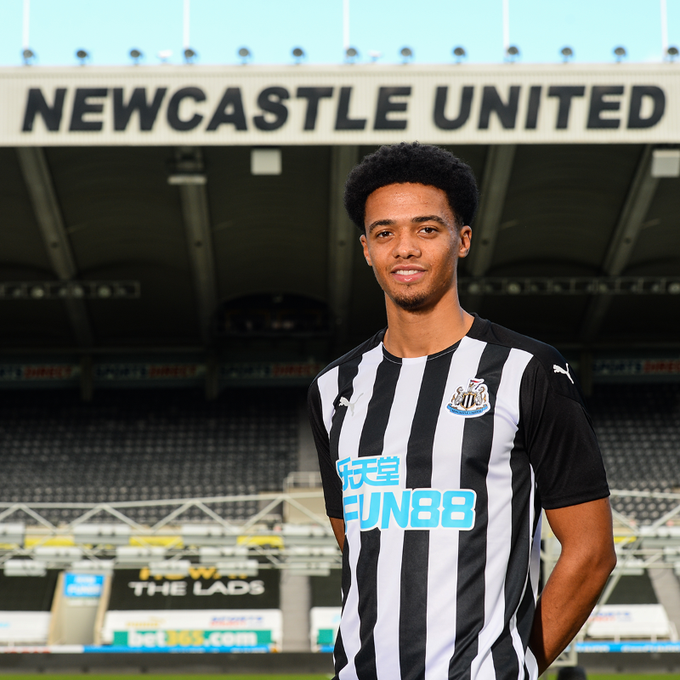 Newcastle United's new signing Jamal Lewis poses in his new kit (Newcastle United)