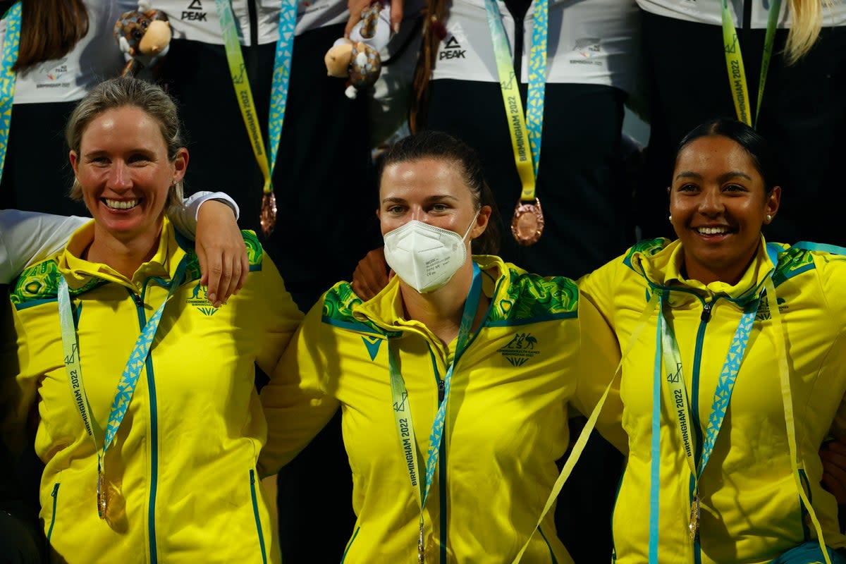 Tahlia McGrath (centre) won gold with Australia in the Twenty20 cricket  (REUTERS)