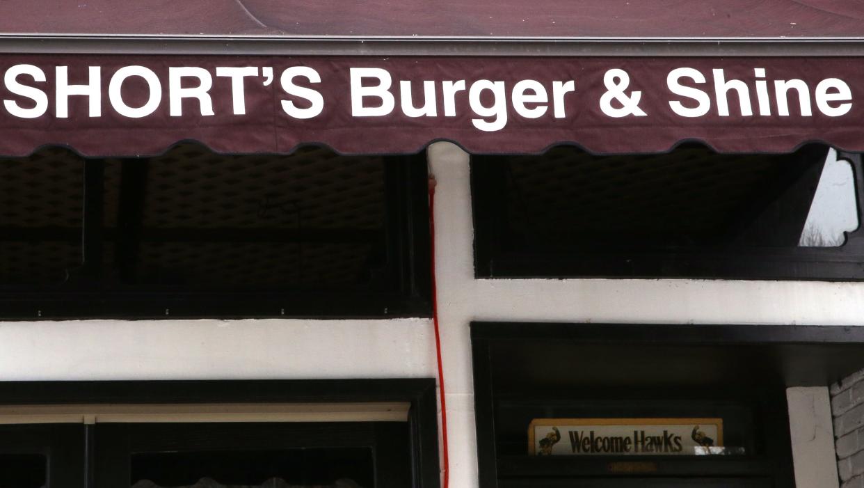 Short’s Burgers & Shine is pictured on Clinton Street Wednesday, Feb. 7, 2024 in Iowa City, Iowa. The business will close its doors this week after a court ruling ended a three-year-long saga.