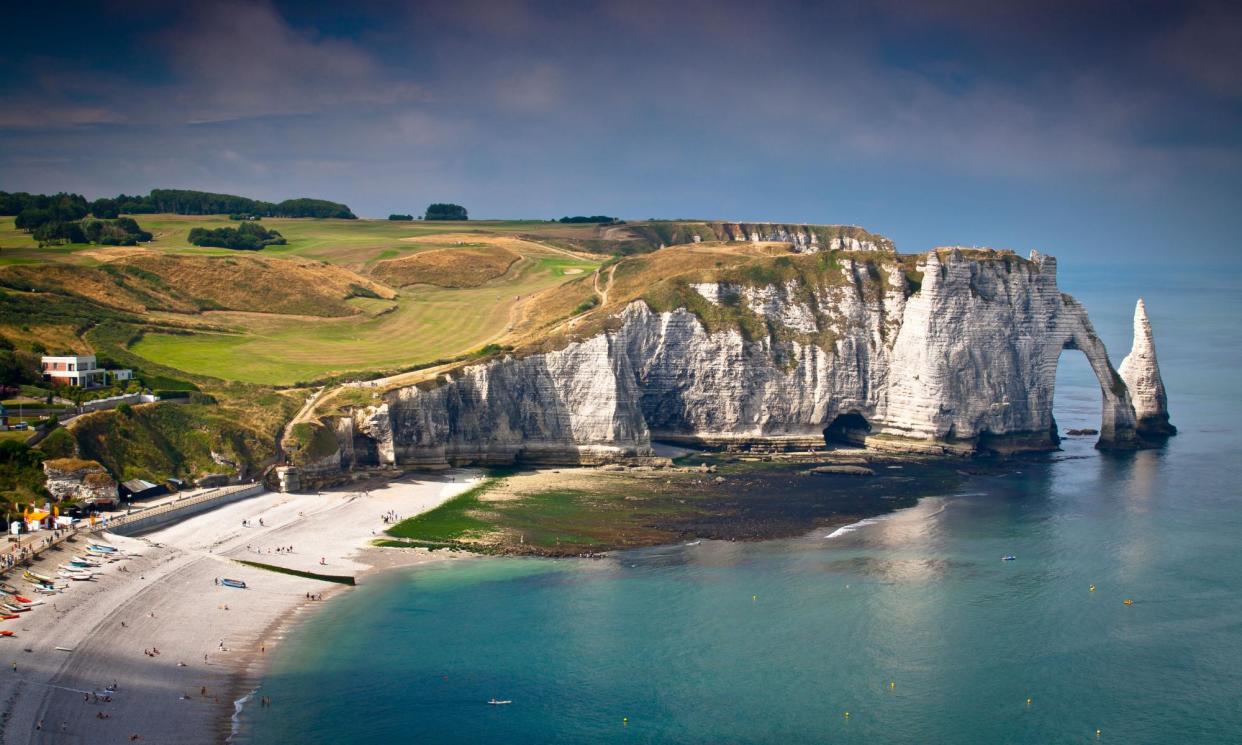 <span>The cliffs, rock arch and beach at Étretat.</span><span>Photograph: Mikel Bilbao Gorostiaga Travels/Alamy</span>