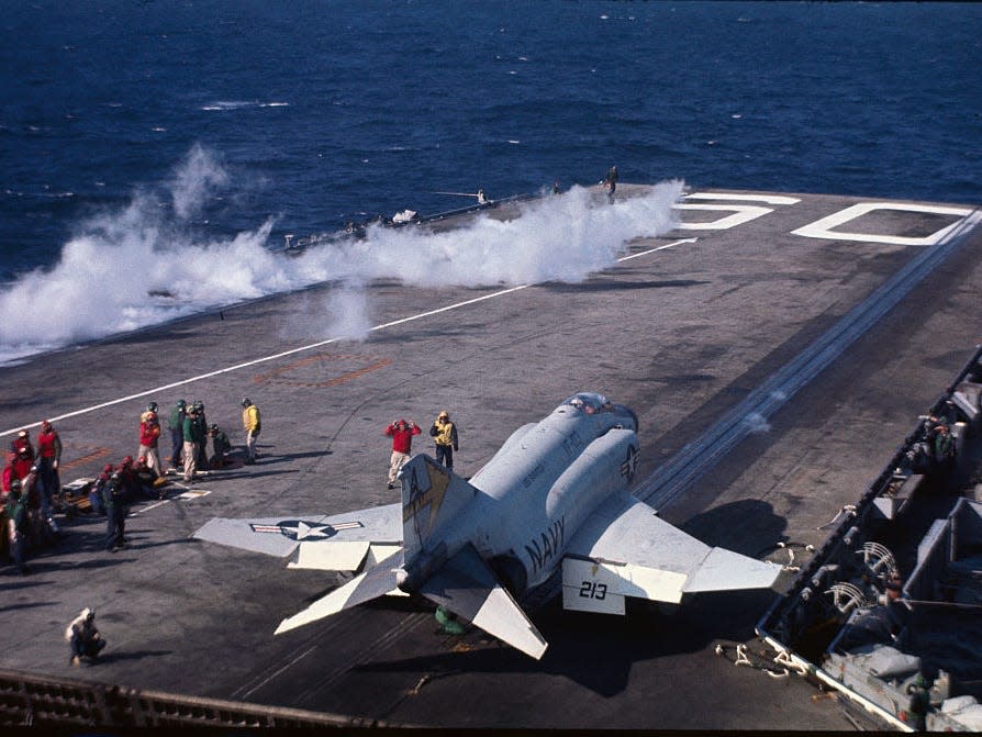 Flight ops aboard USS Saratoga (CVN-60) during a 1969 demonstration of NATO firepower.