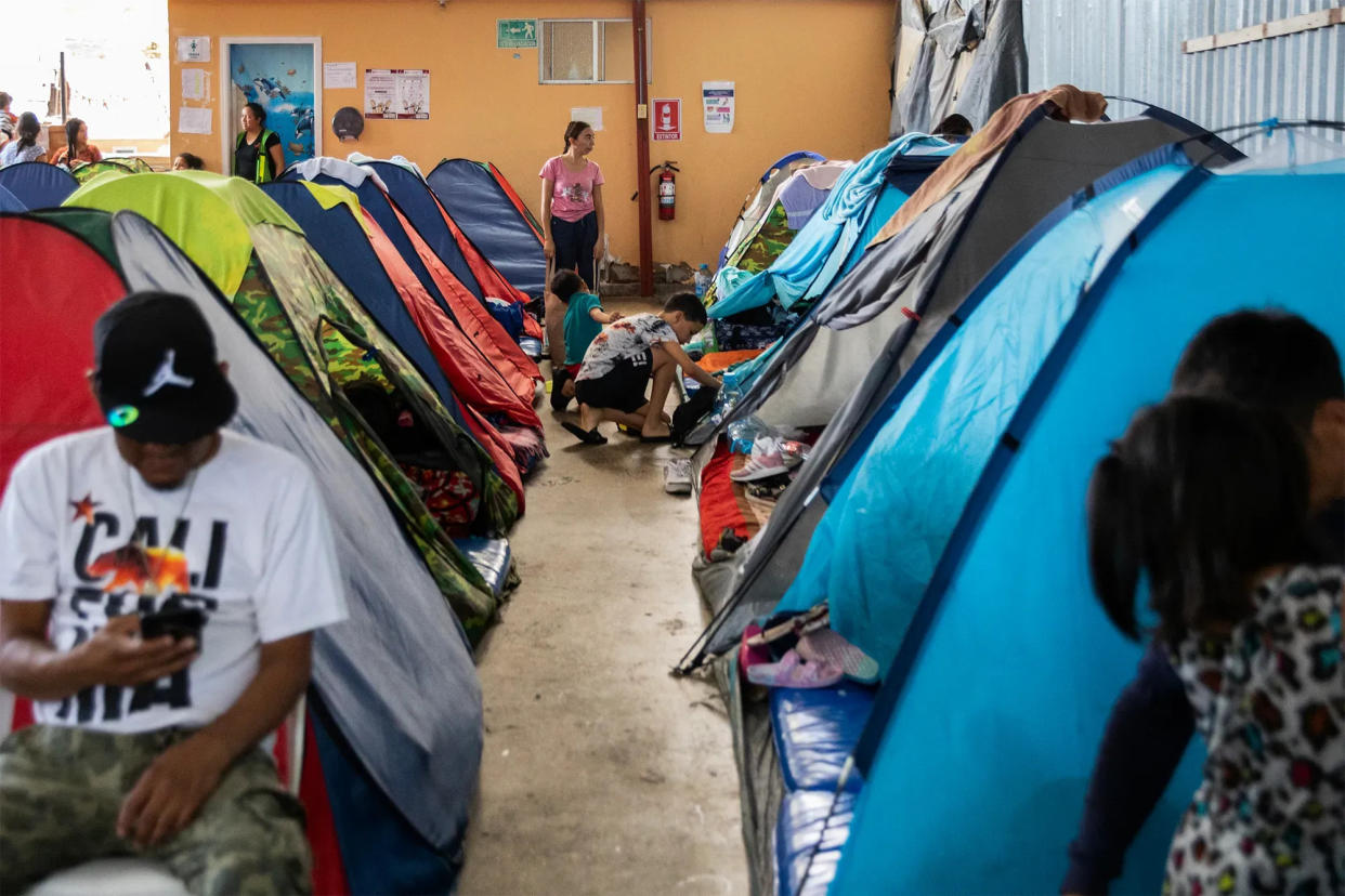 A group of migrants at Moviemiento Juventud 2000, a shelter in Tijuana, on July 26, 2023.