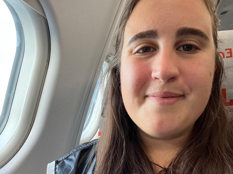 A selfie of the author on a plane.