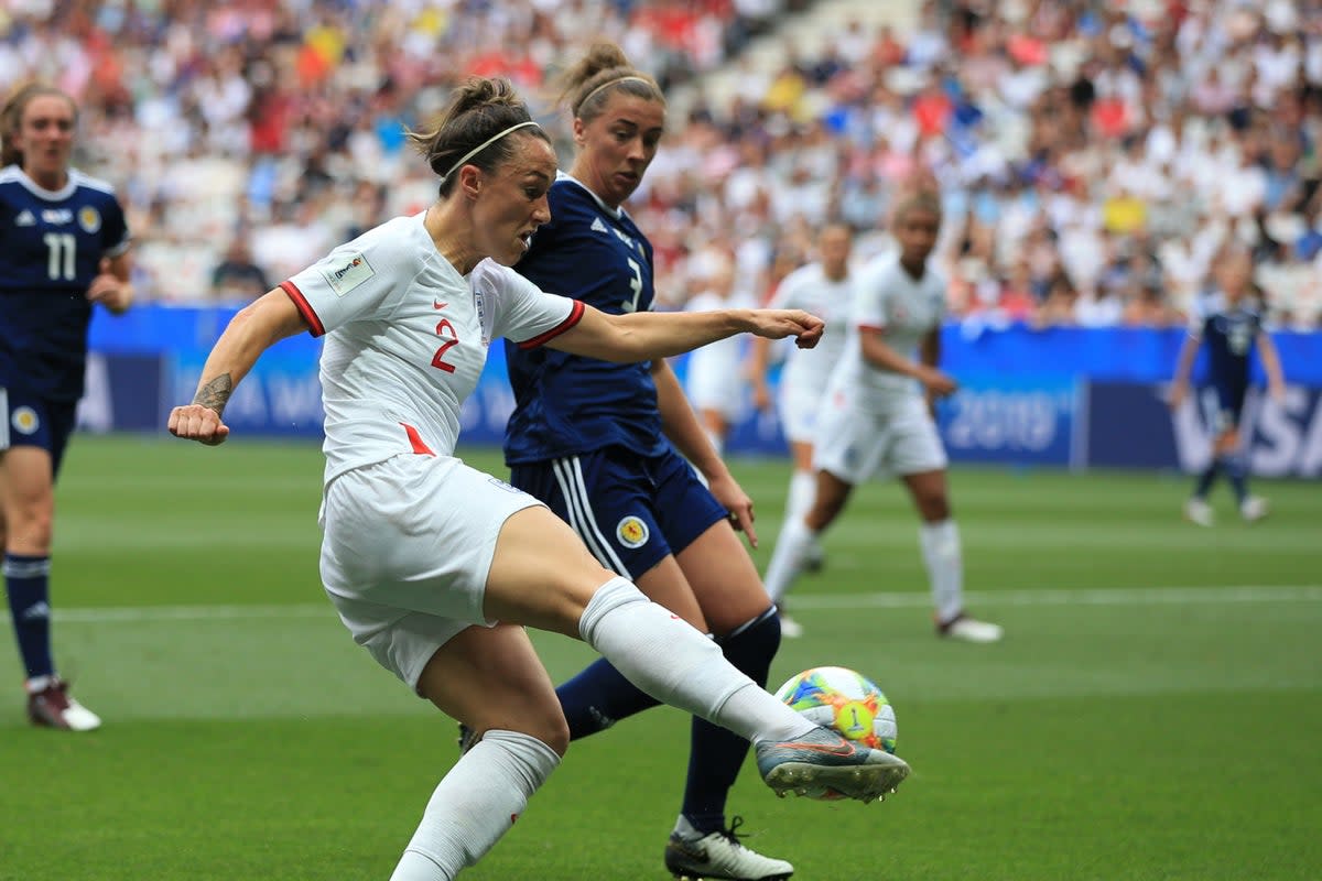 England’s Lucy Bronze competes for the ball with Scotland’s Nicola Docherty at the 2019 Fifa Women's World Cup in France. England will be competing at the 2023 event this summer, but Scotland did not qualify  (Getty Images)