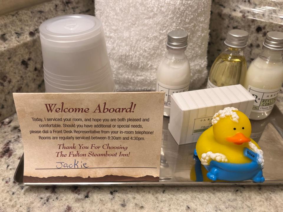 rubber duck on the toiletry tray ina. bathroom at the fulton steamboat inn