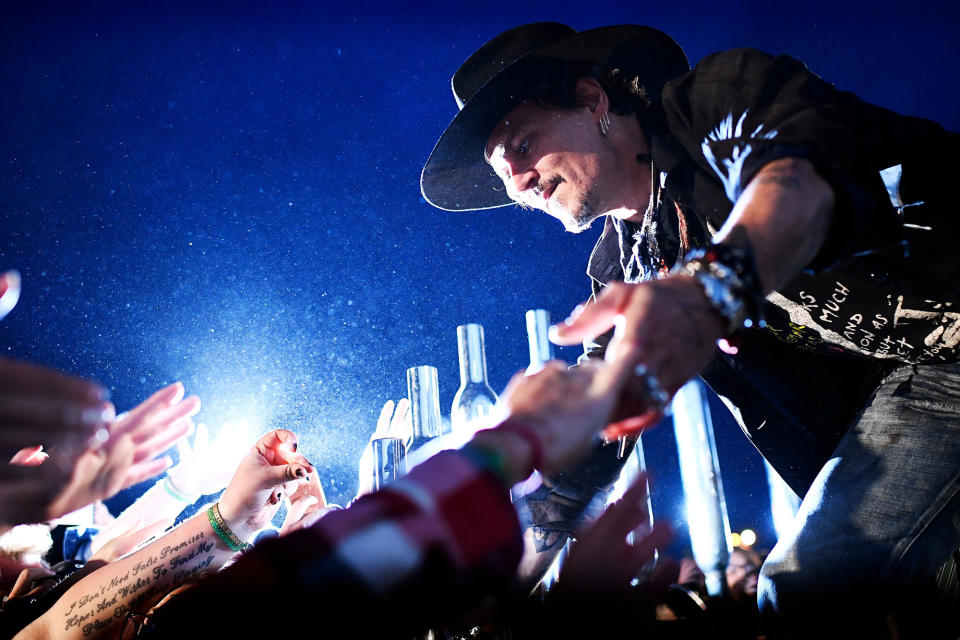 <p>Actor Johnny Depp greets fans before presenting his film The Libertine, at Cinemageddon at Worthy Farm in Somerset during the Glastonbury Festival in Britain, June 22, 2017. (Photo: Dylan Martinez/Reuters) </p>