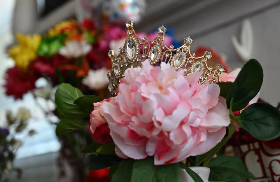 A tiara is seen along with flowers and a balloon for Elvira Madrigal who just celebrated her 107th birthday. Photographed Tuesday, May 7, 2024 in Fresno.