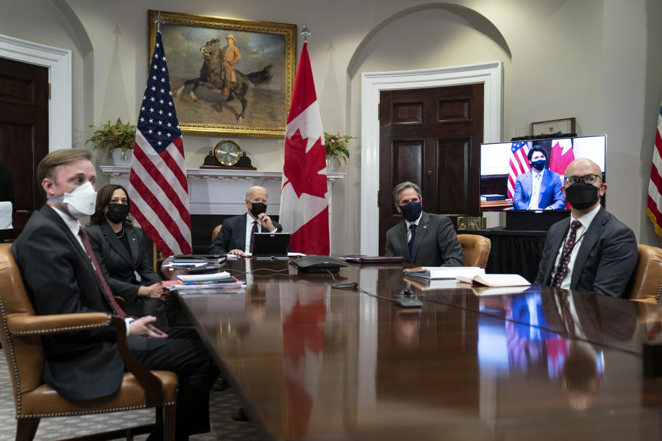 President Joe Biden holds a virtual bilateral meeting with Canadian Prime Minister Justin Trudeau, in the Roosevelt Room of the White House, Tuesday, Feb. 23, 2021, in Washington. From left, White House national security adviser Jake Sullivan, Vice President Kamala Harris, Biden, Secretary of State Antony Blinken, and National Security Council senior director for the Western Hemisphere Juan Gonzalez. (AP Photo/Evan Vucci)