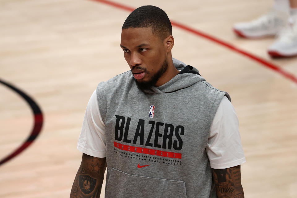 Damian Lillard in a Blazers shirt.