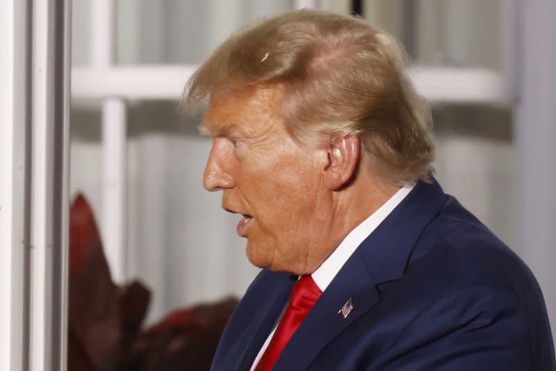 Former President Donald Trump on Thursday dropped his attempt to move his criminal case in Georgia to a federal court. Some of his co-defendants in the election-interference case are still trying to get their cases moved. File Photo by John Angelillo/UPI