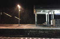 <p>Snow falling at Aldershot Station in Hampshire this morning after wintry weather swept across the country. Met Office meteorologist Simon Partridge said: ‘We have had some quickly changing weather overnight with a band of heavy rain and hill snow that started in the south west and is gradually moving north and eastwards.’ (PA) </p>