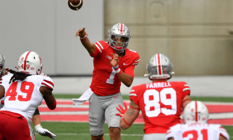 Ohio State quarterback Justin Fields throws a pass.