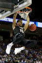 <p>Aubrey Dawkins #15 of the UCF Knights dunks the ball against the Duke Blue Devils during the second half in the second round game of the 2019 NCAA Men’s Basketball Tournament at Colonial Life Arena on March 24, 2019 in Columbia, South Carolina. (Photo by Streeter Lecka/Getty Images) </p>