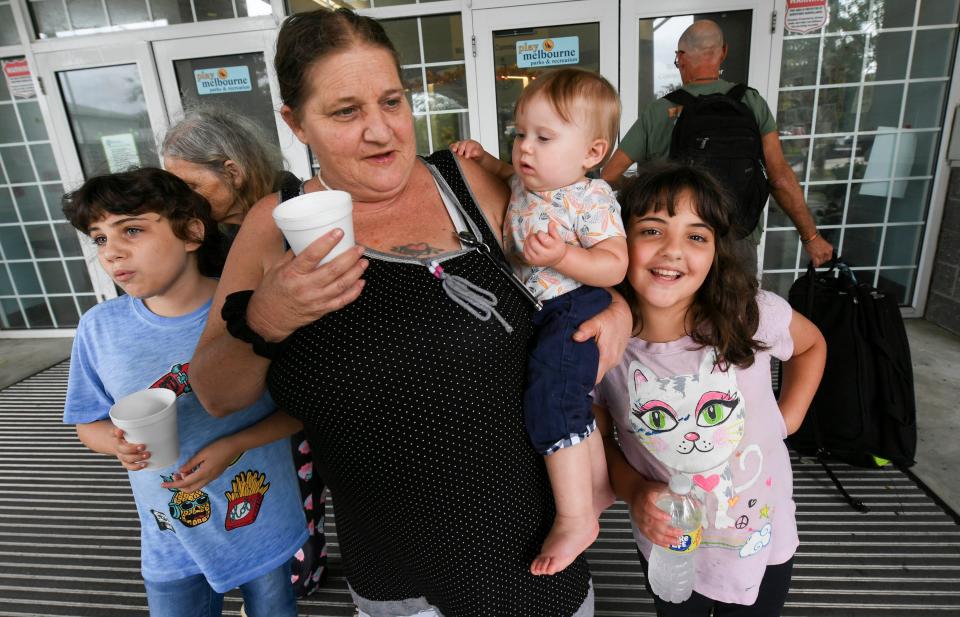 Melody WIthrow and her grandchildren Jasmine, Mckenzie and Jenna stand outside the hurricane shelter at Wickham Park in Melbourne Wednesday, September 28, 2022. Craig Bailey/FLORIDA TODAY via USA TODAY NETWORK