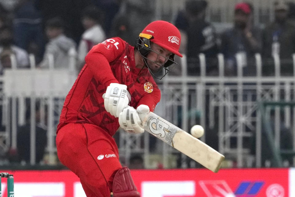 Islamabad United' Colin Munro plays a shot during the Pakistan Super League T20 cricket match between Islamabad United and Multan Sultans, in Rawalpindi, Pakistan, Sunday, March 10, 2024. (AP Photo/Anjum Naveed)