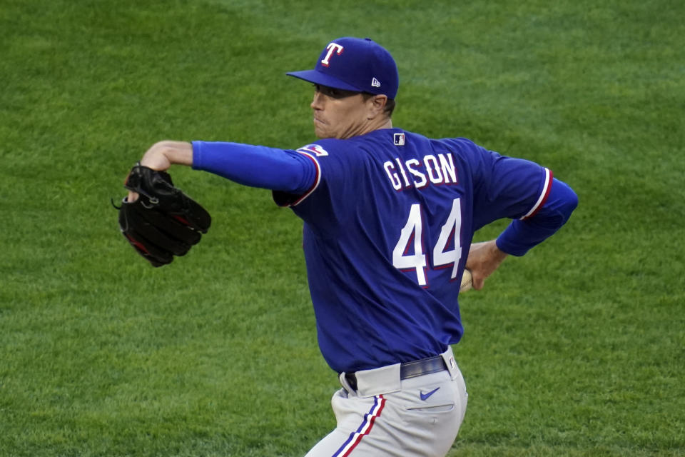 Texas Rangers' pitcher Kyle Gibson (44) throws against the Minnesota Twins in the first inning of a baseball game, Tuesday, May 4, 2021, in Minneapolis. (AP Photo/Jim Mone)