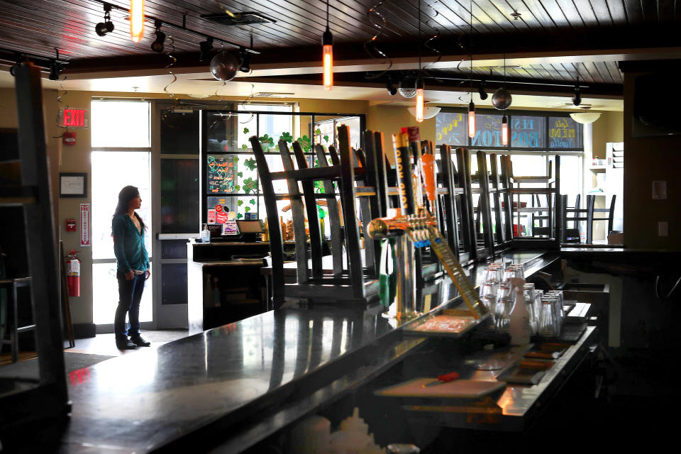 BOSTON, MA - APRIL 22: Asia Mei, owner of Moonshine 152, poses in her restaurant, which has been shut down due to COVID-19, on April 22, 2020. Her corner bar and food served the local South Boston community. (Photo by John Tlumacki/The Boston Globe via Getty Images)