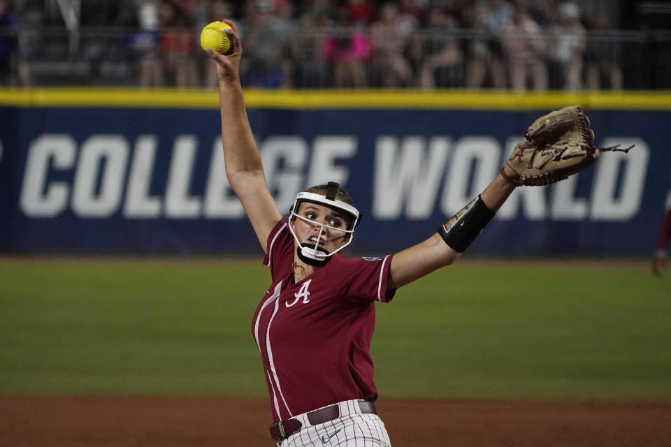 Alabama's Montana Fouts pitches in the first inning of the team's NCAA Women's College World Series softball game against UCLA, Friday, June 4, 2021, in Oklahoma City. (AP Photo/Sue Ogrocki)