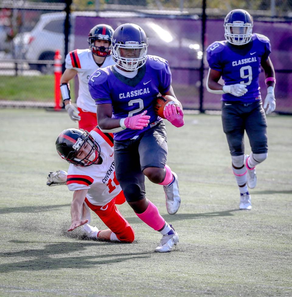 Classical's Jordan Duke beats a Coventry defender for big yardage during a game last year.