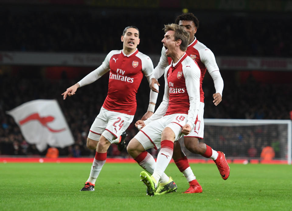 Arsenal players celebrate during the Carabao Cup Semi-Final Second Leg (Photo by Stuart MacFarlane/Arsenal FC via Getty Images)