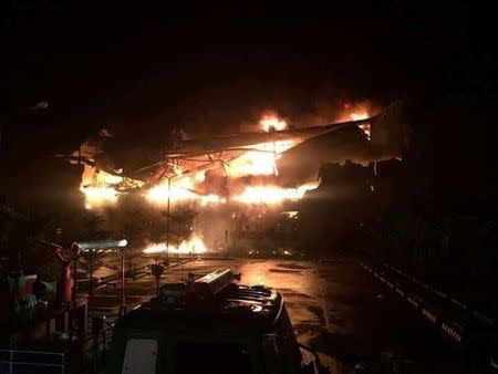 Flames engulf a mall on fire in Davao City, the Philippines, in this December 23, 2017 photo obtained from social media. Ashley Nicole Avila Rafaela/via REUTERS