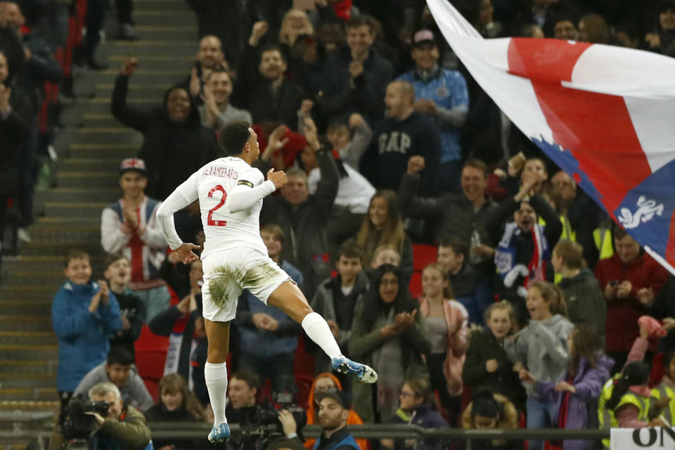 England's Trent Alexander-Arnold celebrates scoring his side's second goal during the international friendly soccer match between England and the United States at Wembley stadium, Thursday, Nov. 15, 2018. (AP Photo/Alastair Grant)