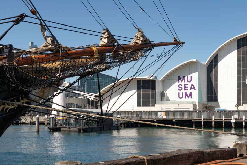 Sydney, New South Wales, Australia: Australian Maritime Museum at Darling Harbour. The museum is framed from the left by the bow of tall ship the James Craig.