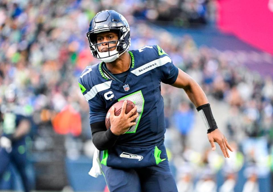 Seattle Seahawks quarterback Geno Smith (7) carries the ball during the third quarter of the game against the Pittsburgh Steelers at Lumen Field, on Sunday, Dec. 31, 2023, in Seattle, Wash.