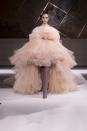 <p>Giambattista Valli traded his usual Haute Couture Fashion Week show for a video presentation titled the “Valli Experience” that merged his Spring 2022 couture collection with Pre-fall 2022 ready to wear. That made for some unexpected looks among the frou, like PVC-trimmed bouclé jackets and denim. The harder edge even seemed to rub off on the couture looks, which included an uncharacteristic number of black styles cut in silk mousseline, taffeta, and faille. But that’s not to say Valli forwent his signature flights of fancy entirely: there were feather embroideries and, of course, multi-layered plissé tulle gowns, which this season came in romantic hues of blush, peach, and scarlet. <em>—Alison S. Cohn</em></p>